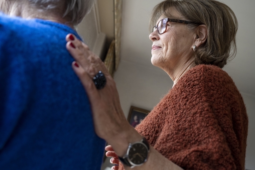 Carer comforting a client