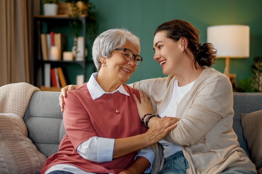 Client and a carer having a hug