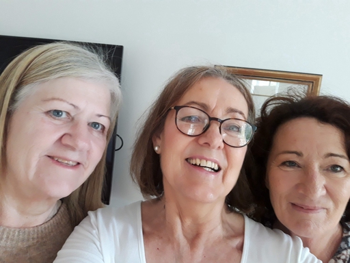 Two Consultus Carers either side of Helen