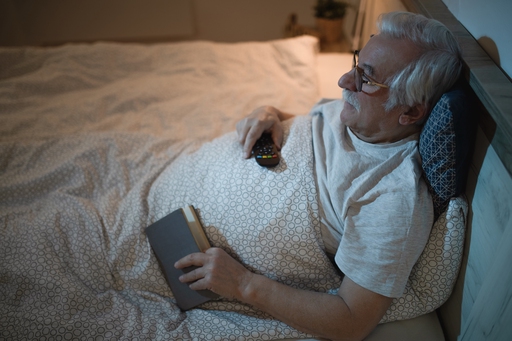 Client and carer sat on sofa