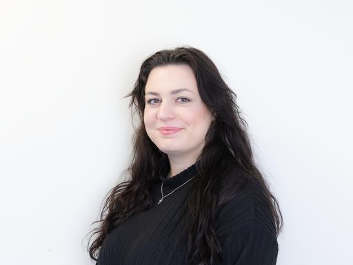 A man shaking an elderly women's hand